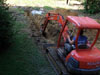 Horizontal trench being dug from geo wells to the home utility room.