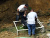 Geothermal loop is placed on the white unreeler and filled with clean water to overcome the buoyancy of the pipe.